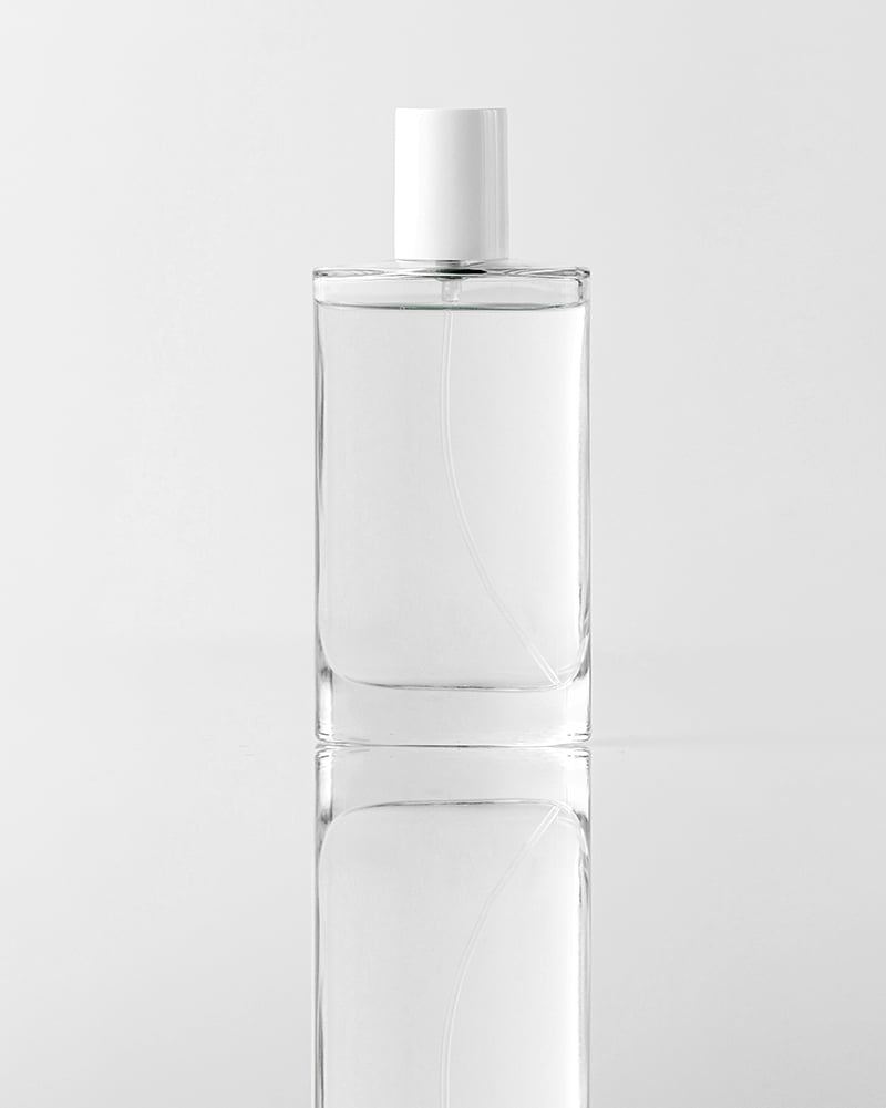 a front view transparent bottle for face cleaning procedures on